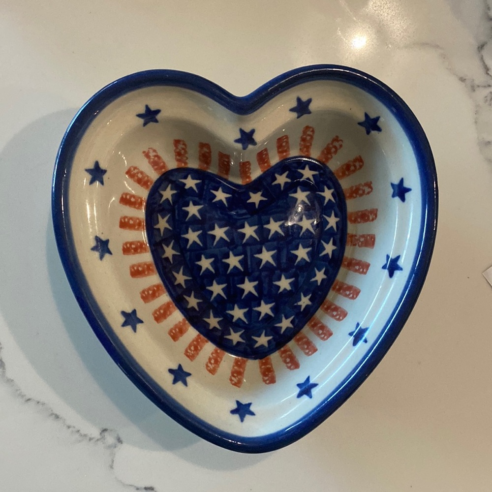 Polish pottery, Americana used it as a dish or has place to hang on wall.